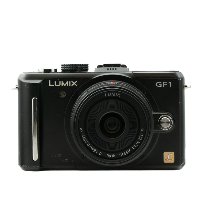 Occasion Panasonic DMC-GF1 Schwarz + 14mm f/2.5 G ASPH