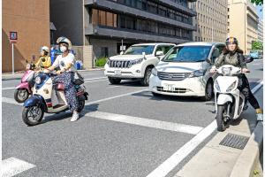 Unterwegs mit Mundschutz auf Japans Strassen Unterwegs mit Mundschutz auf Japans Strassen