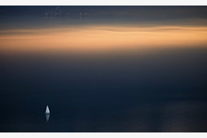 Sailing away at golden hour 
