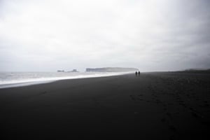 Walk on a black Beach
