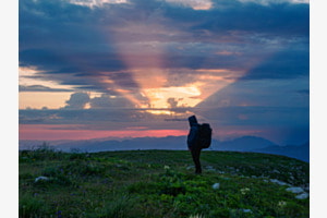 Sonnenaufgang mit Wanderer, Chäserrugg