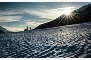 Letzte Sonnenstrahlen auf die Fäudkapäue im Goms
